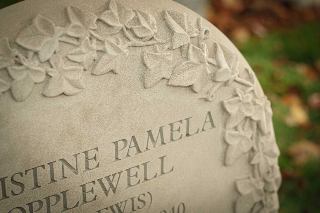 Ornate stonework on a headstone